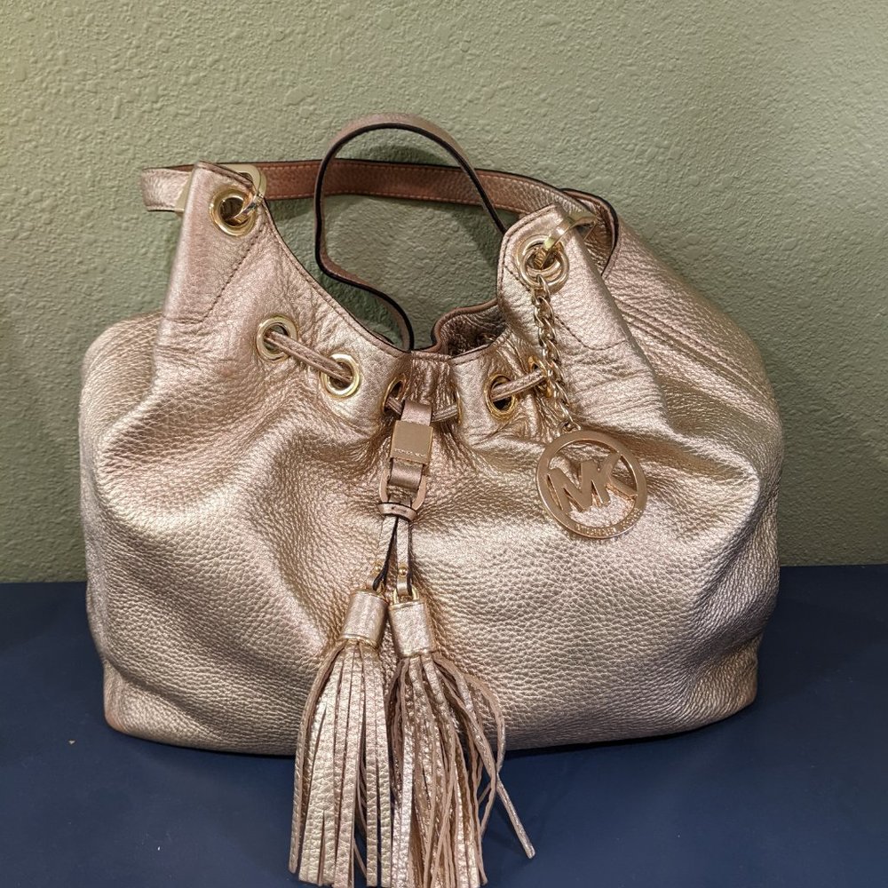 Michael Kors Slouchy Pebbled Leather Shoulder Bag in Gold. (11 x 14") Used